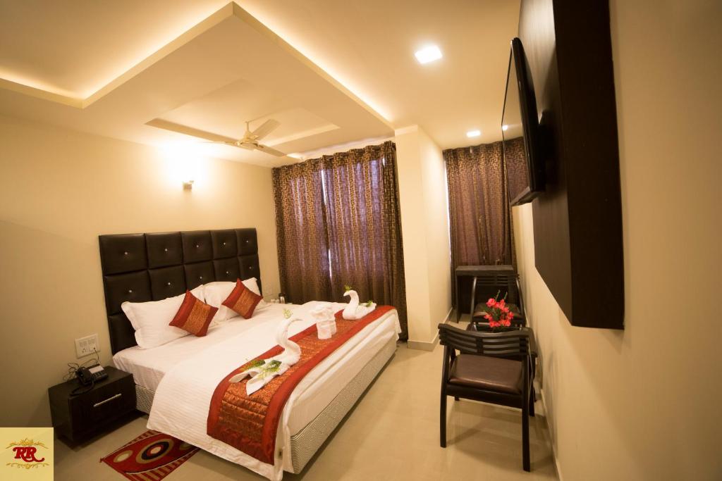Katil atau katil-katil dalam bilik di Hotel Royal Rosette
