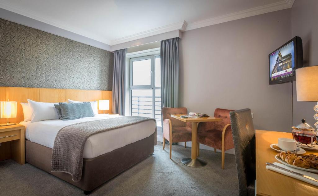 Postel nebo postele na pokoji v ubytování Talbot Hotel Wexford