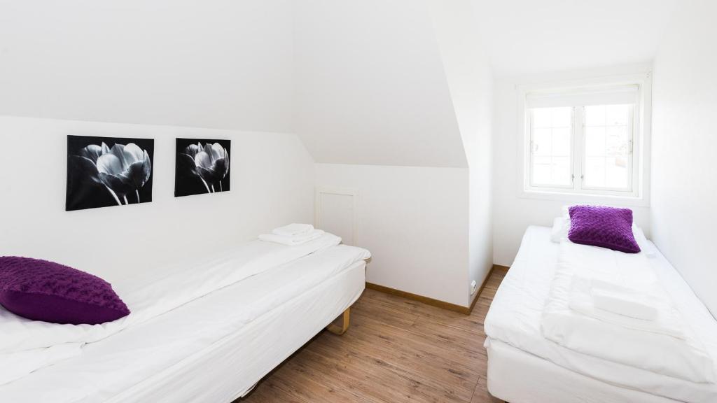 Postel nebo postele na pokoji v ubytování Verkshotellet Jørpeland