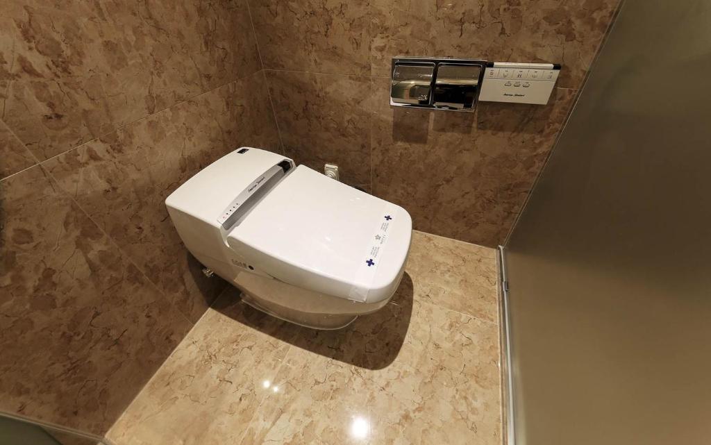 Koupelna v ubytování Guwol Hotel