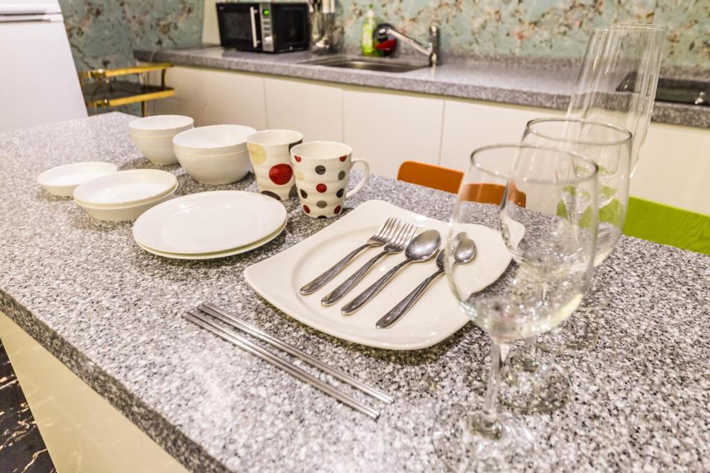 Kuchyň nebo kuchyňský kout v ubytování Guwol Hotel