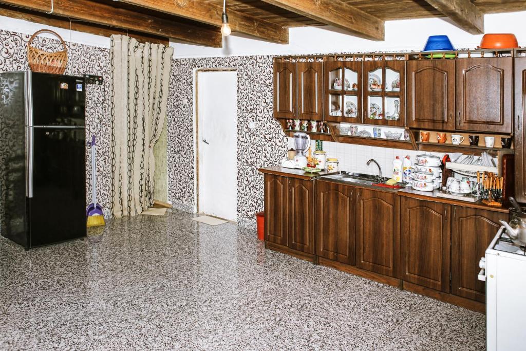 Kuchyň nebo kuchyňský kout v ubytování Daraselia Family guesthouse