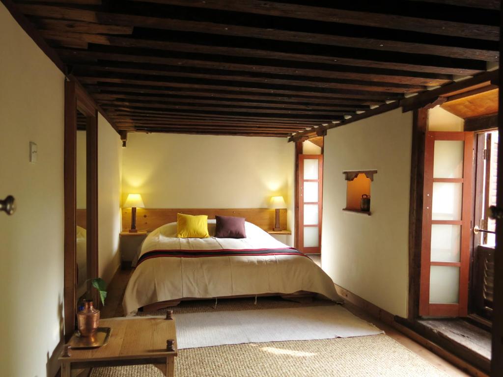 Postel nebo postele na pokoji v ubytování The Inn Patan