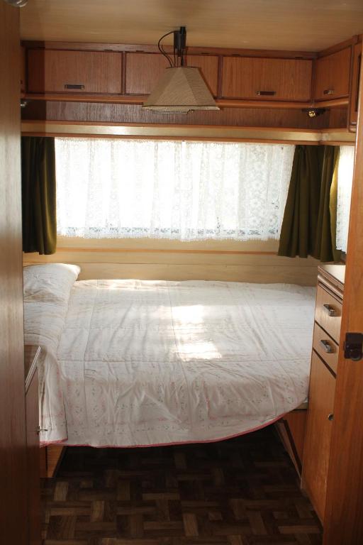 Postel nebo postele na pokoji v ubytování Camping Parco Capraro