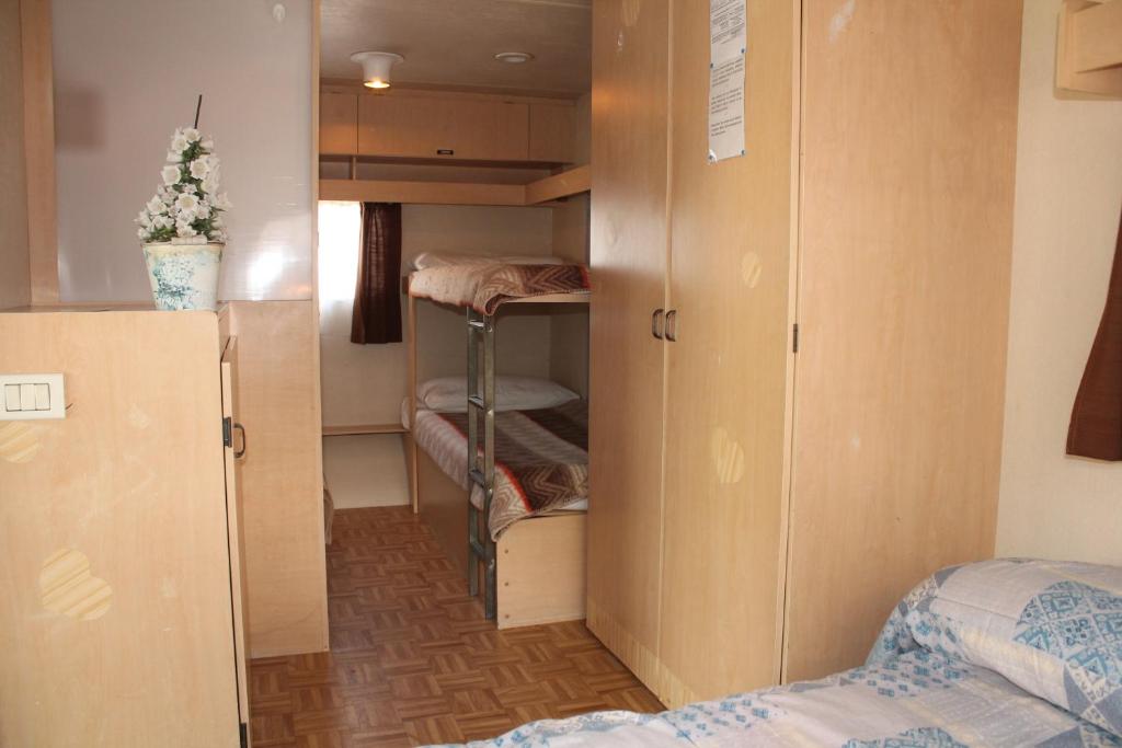 Postel nebo postele na pokoji v ubytování Camping Parco Capraro