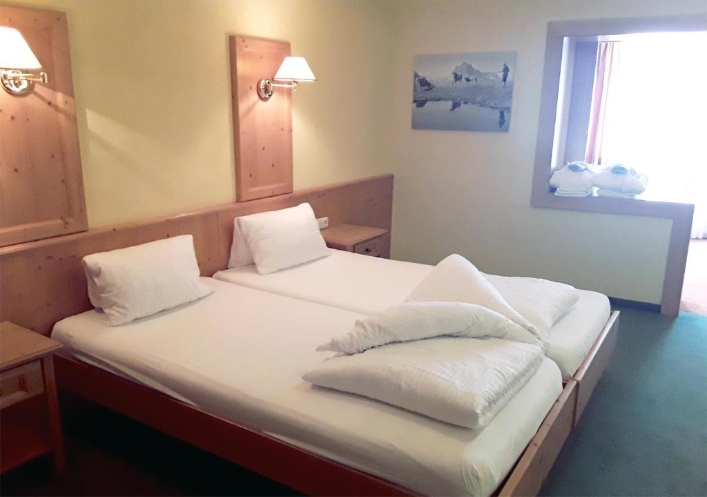Postel nebo postele na pokoji v ubytování Hotel Nassereinerhof