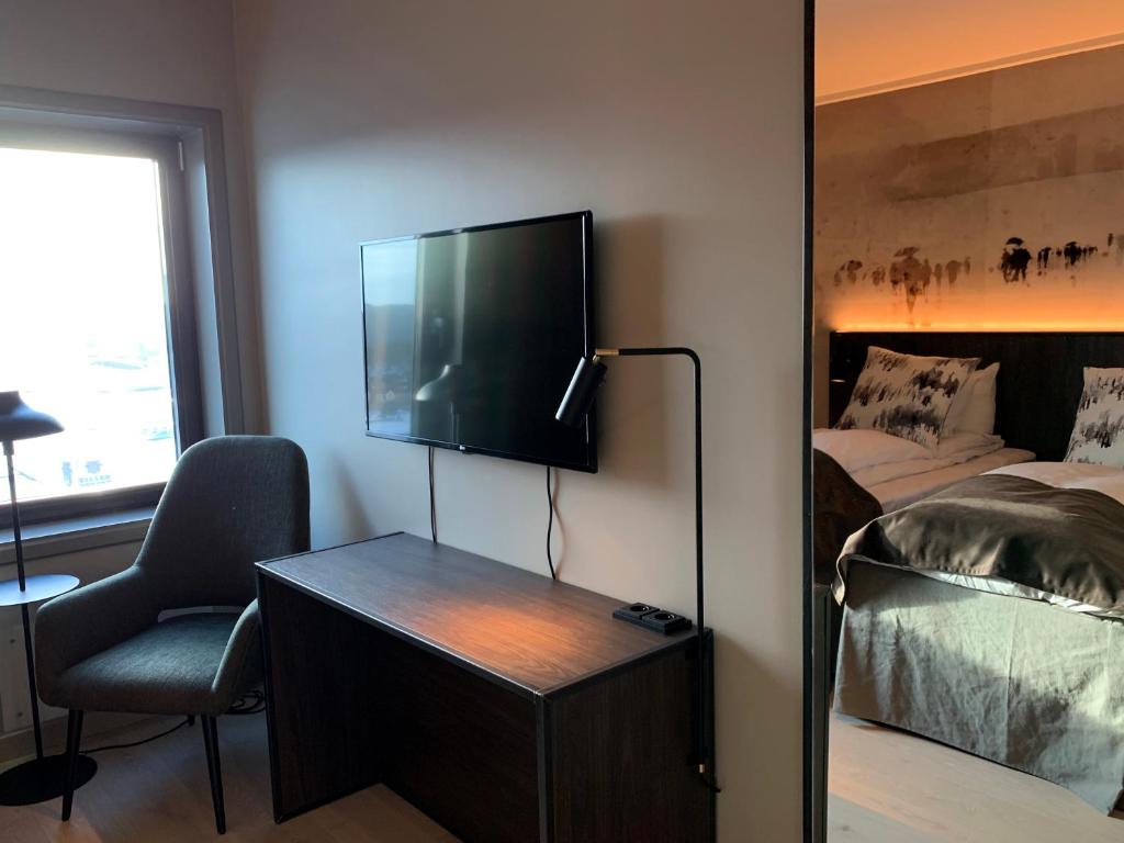 Postel nebo postele na pokoji v ubytování Quality Hotel Panorama