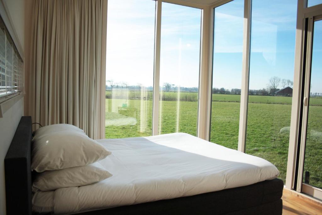 Postel nebo postele na pokoji v ubytování Hotel & Restaurant Weidumerhout