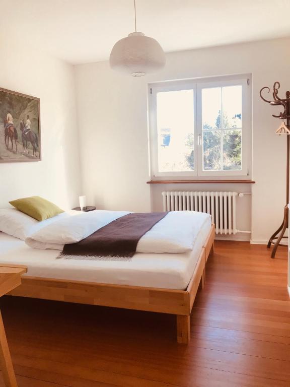 Postel nebo postele na pokoji v ubytování au jardin