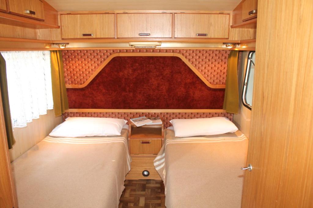 Postel nebo postele na pokoji v ubytování Camping Parco Capraro