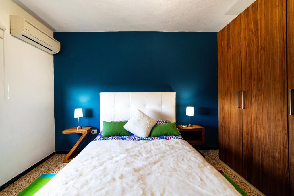 Postel nebo postele na pokoji v ubytování CASA LUJAN