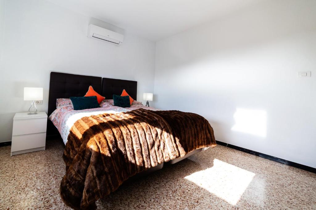 Postel nebo postele na pokoji v ubytování CASA LUJAN