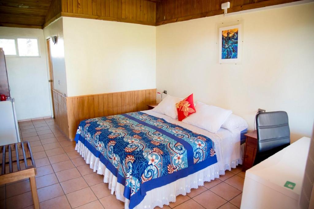 Postel nebo postele na pokoji v ubytování Hotel Taura'a
