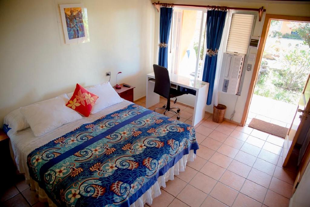 Postel nebo postele na pokoji v ubytování Hotel Taura'a