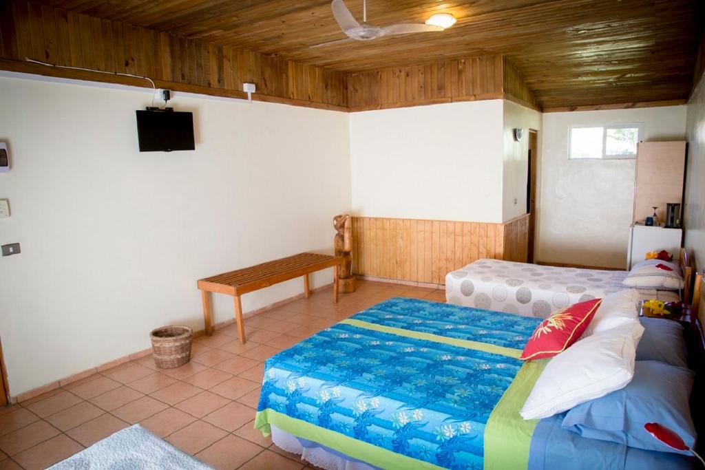 Postel nebo postele na pokoji v ubytování Hotel Taura'a