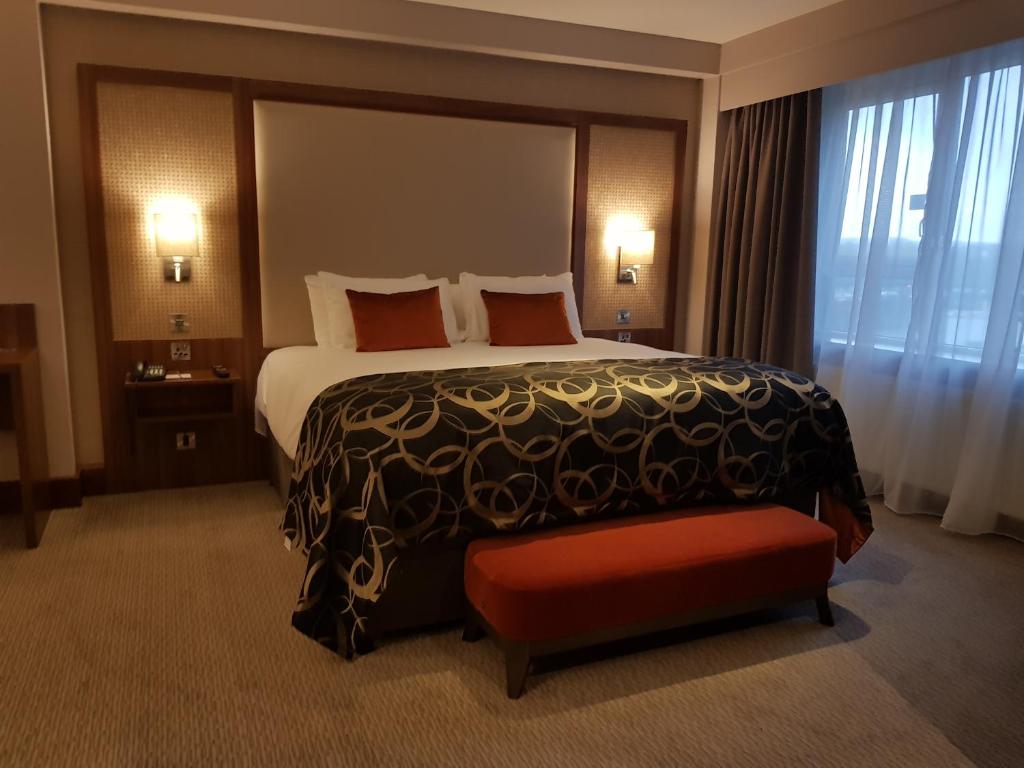 Postel nebo postele na pokoji v ubytování Clayton Hotel Silver Springs