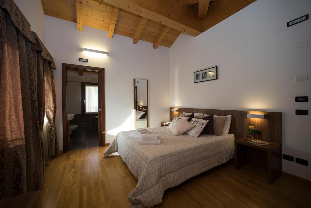 Posteľ alebo postele v izbe v ubytovaní Hotel C25