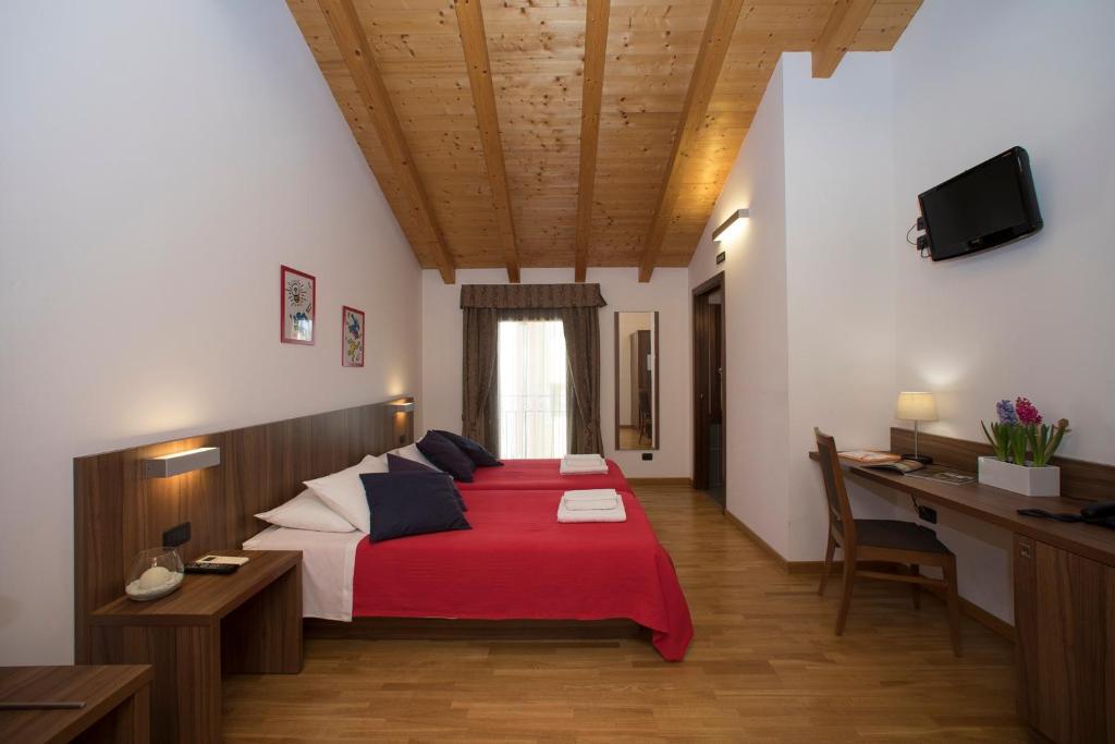 Posteľ alebo postele v izbe v ubytovaní Hotel C25