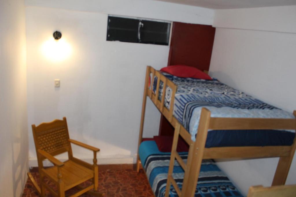 Postel nebo postele na pokoji v ubytování Kame House hostel