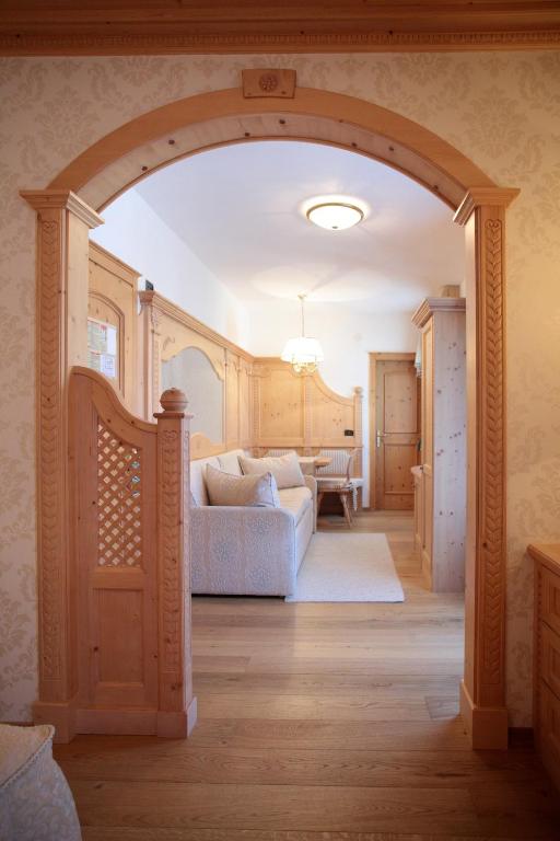 Łóżko lub łóżka w pokoju w obiekcie Hotel Colbricon Beauty & Relax