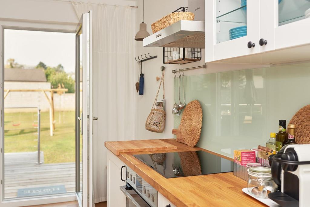 Kuchyň nebo kuchyňský kout v ubytování Logis 11 Apartments