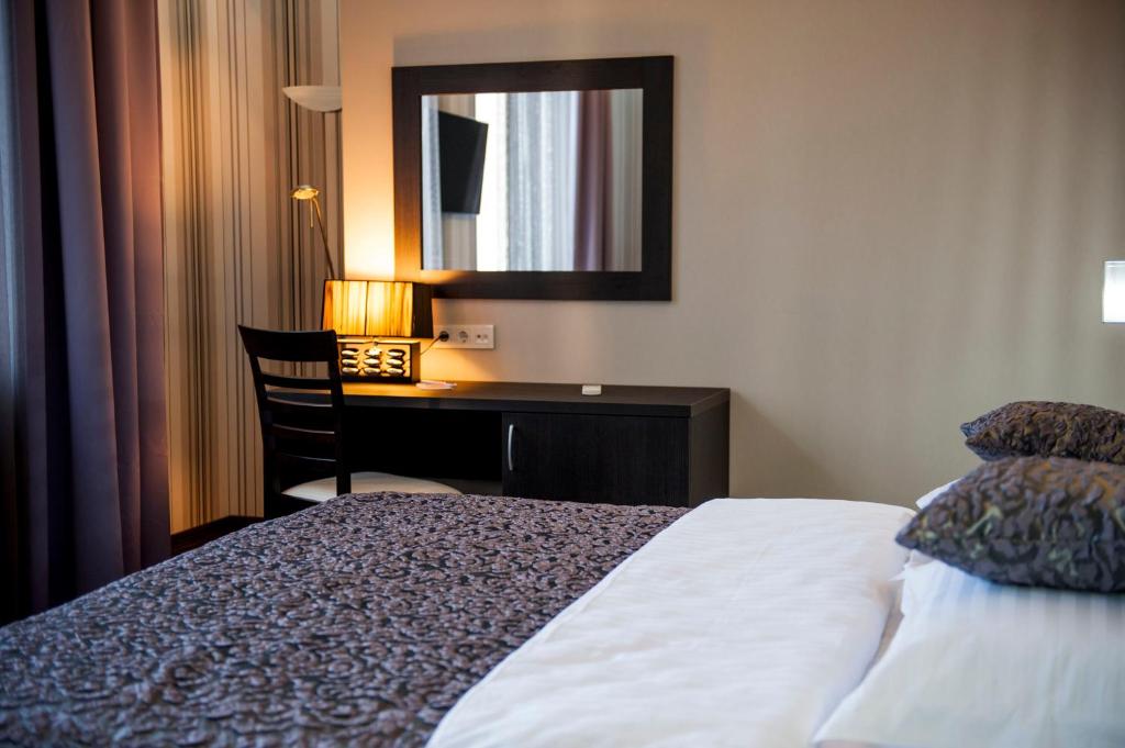Postel nebo postele na pokoji v ubytování Boutique Apart - Hotel iArcadia