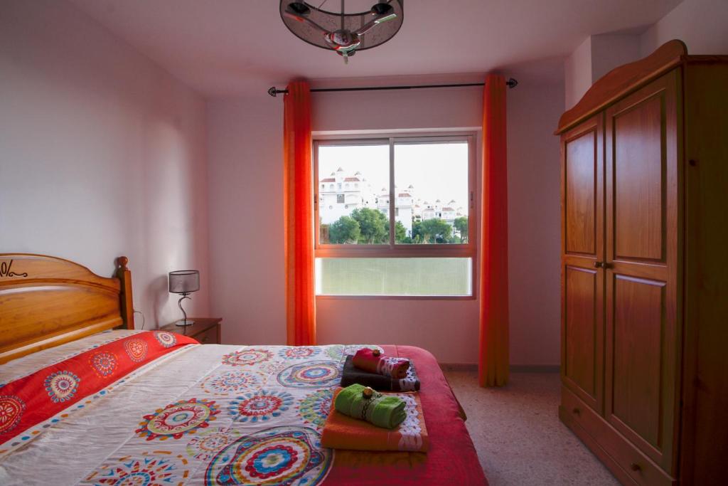 A bed or beds in a room at Beach and Family