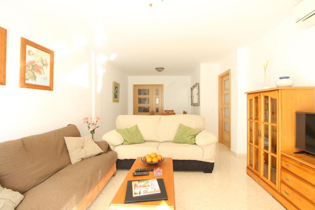 A seating area at Beach and Family