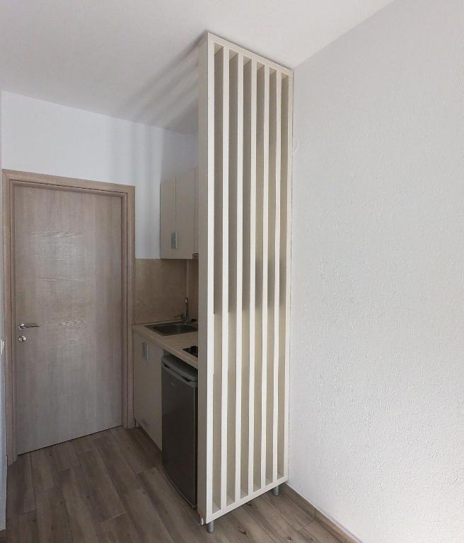 A kitchen or kitchenette at Finikas Garden Beach Resort Nikiti