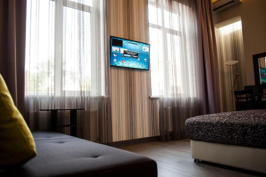 TV a/nebo společenská místnost v ubytování Boutique Apart - Hotel iArcadia
