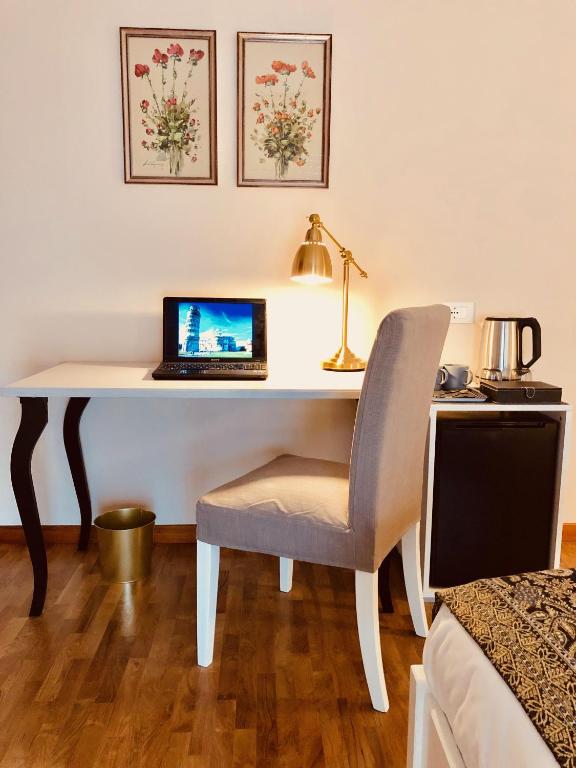 TV a/nebo společenská místnost v ubytování Casa Ciampi Locazione Turistica