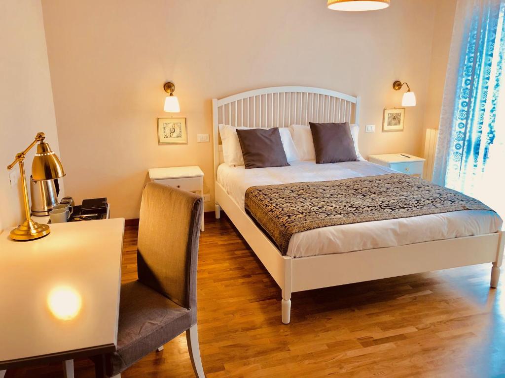 Postel nebo postele na pokoji v ubytování Casa Ciampi Locazione Turistica