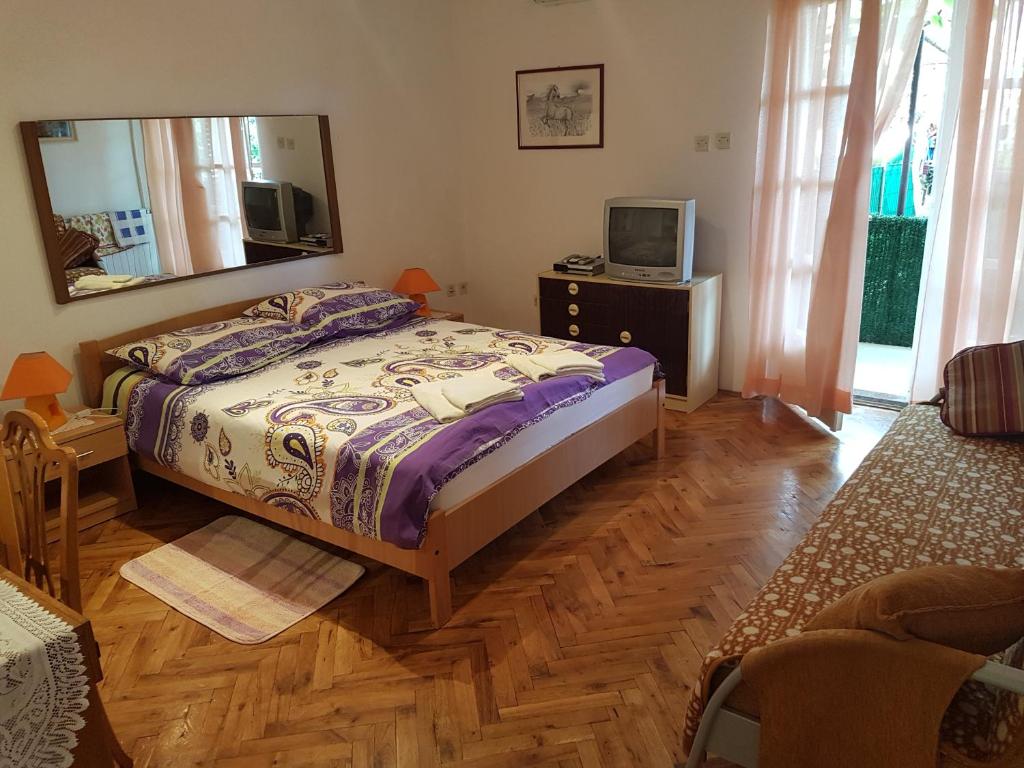 Postel nebo postele na pokoji v ubytování Materada 22