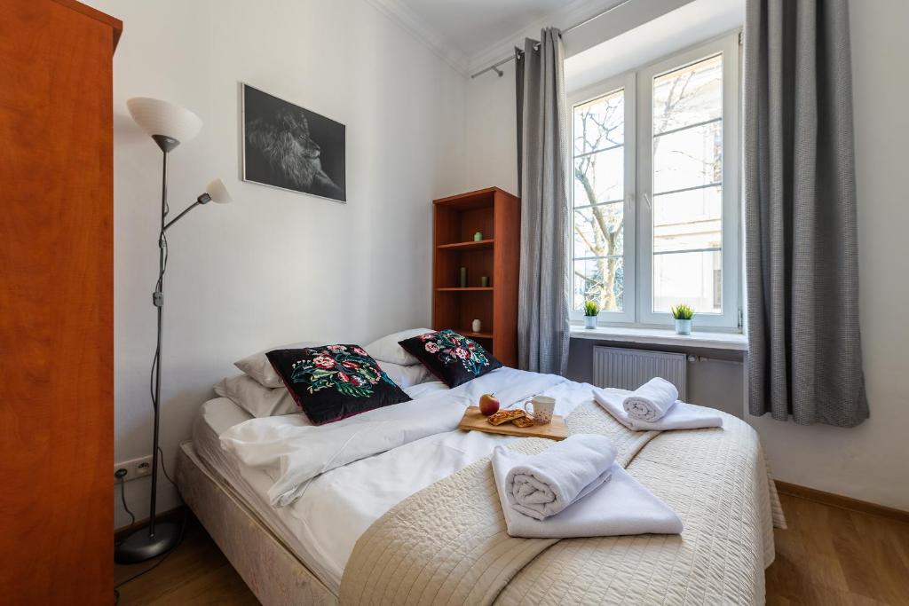 Posteľ alebo postele v izbe v ubytovaní P&O Apartments Old Town