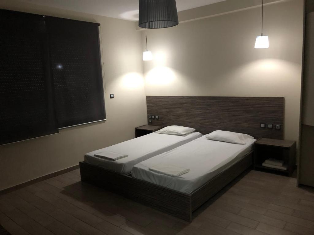 Postel nebo postele na pokoji v ubytování roomotel.com
