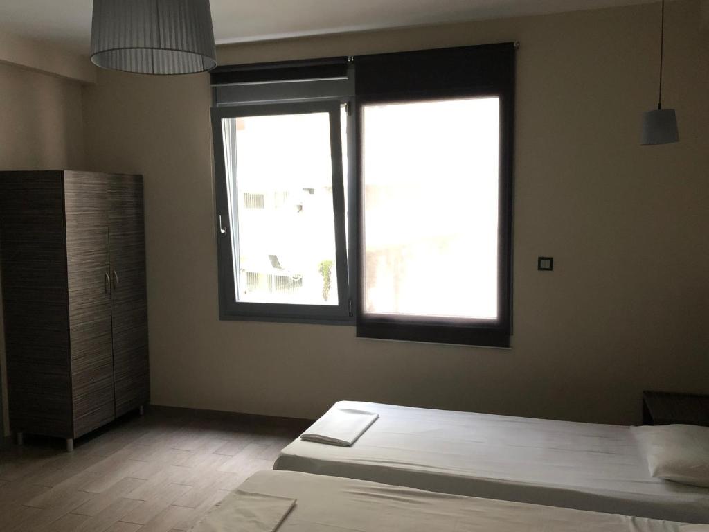 Postel nebo postele na pokoji v ubytování roomotel.com