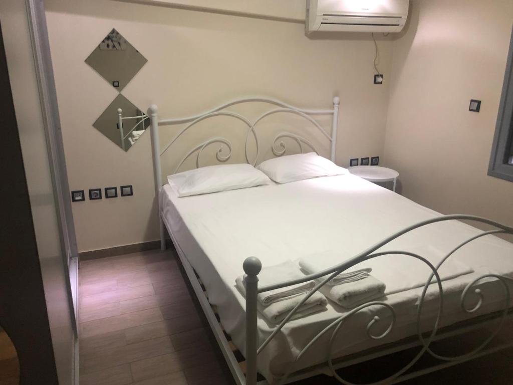 Postel nebo postele na pokoji v ubytování roomotel.com