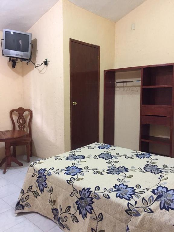 Postel nebo postele na pokoji v ubytování Hotel Lienzo Charro 1