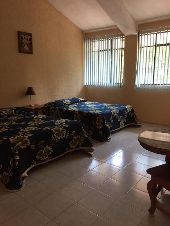 Posezení v ubytování Hotel Lienzo Charro 1