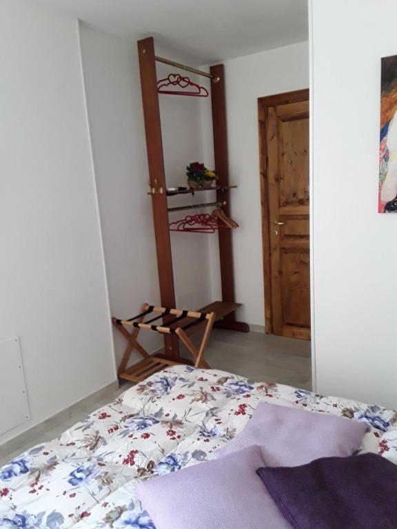 Postel nebo postele na pokoji v ubytování La casetta di Giuci