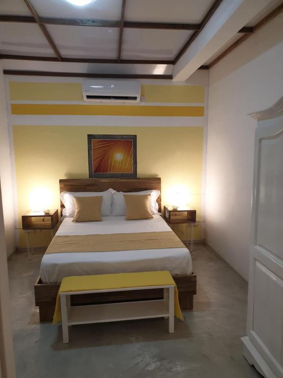Postel nebo postele na pokoji v ubytování Casa Frangipani Mauritius