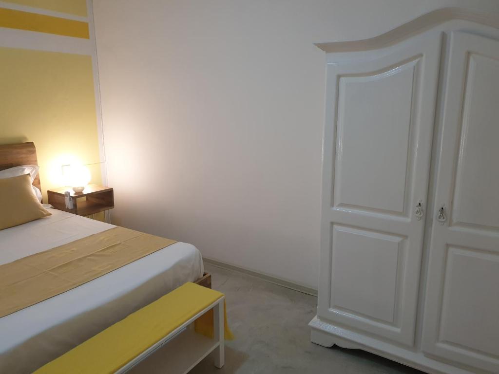 Postel nebo postele na pokoji v ubytování Casa Frangipani Mauritius