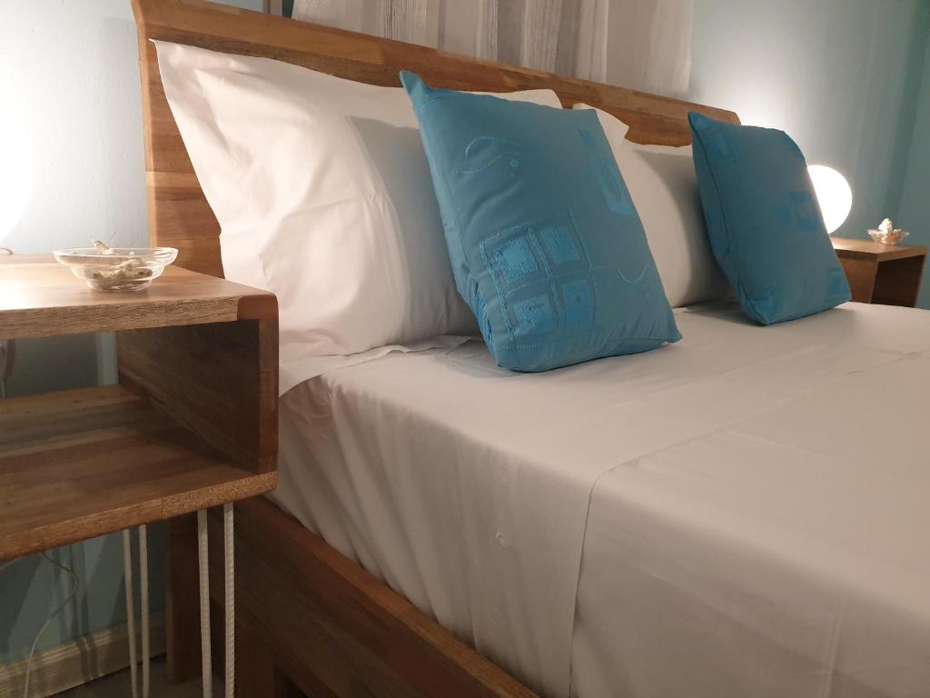 Postel nebo postele na pokoji v ubytování Casa Frangipani Mauritius