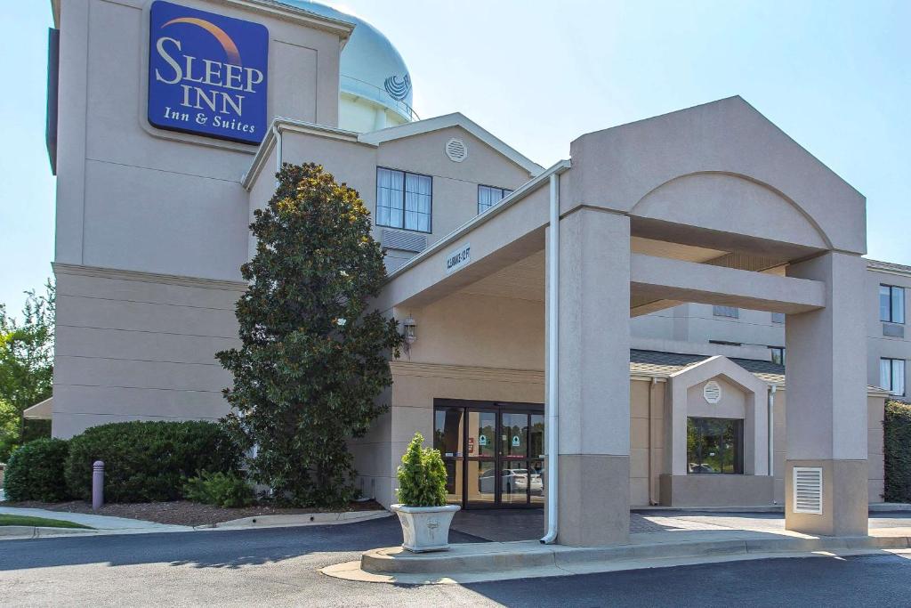 a sign on the front of a hotel at Sleep Inn & Suites North Augusta in North Augusta