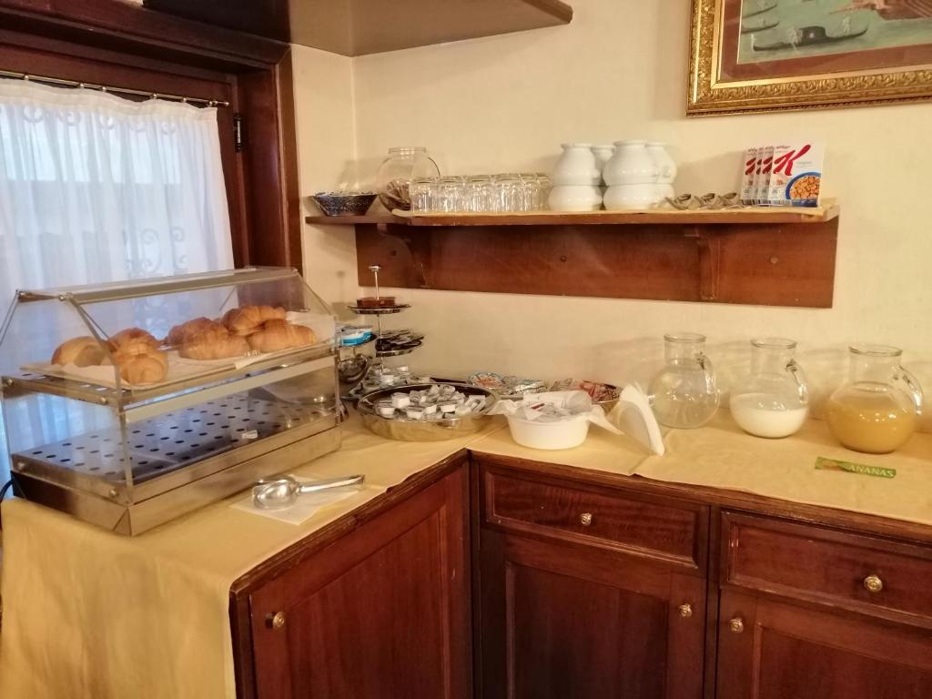 Kuchyň nebo kuchyňský kout v ubytování Hotel Falier