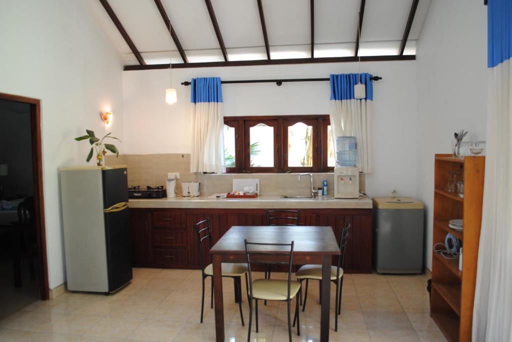 Kuchyň nebo kuchyňský kout v ubytování Sujeewani Villa