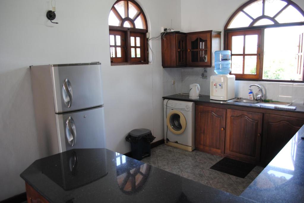 Kuchyň nebo kuchyňský kout v ubytování Sujeewani Villa