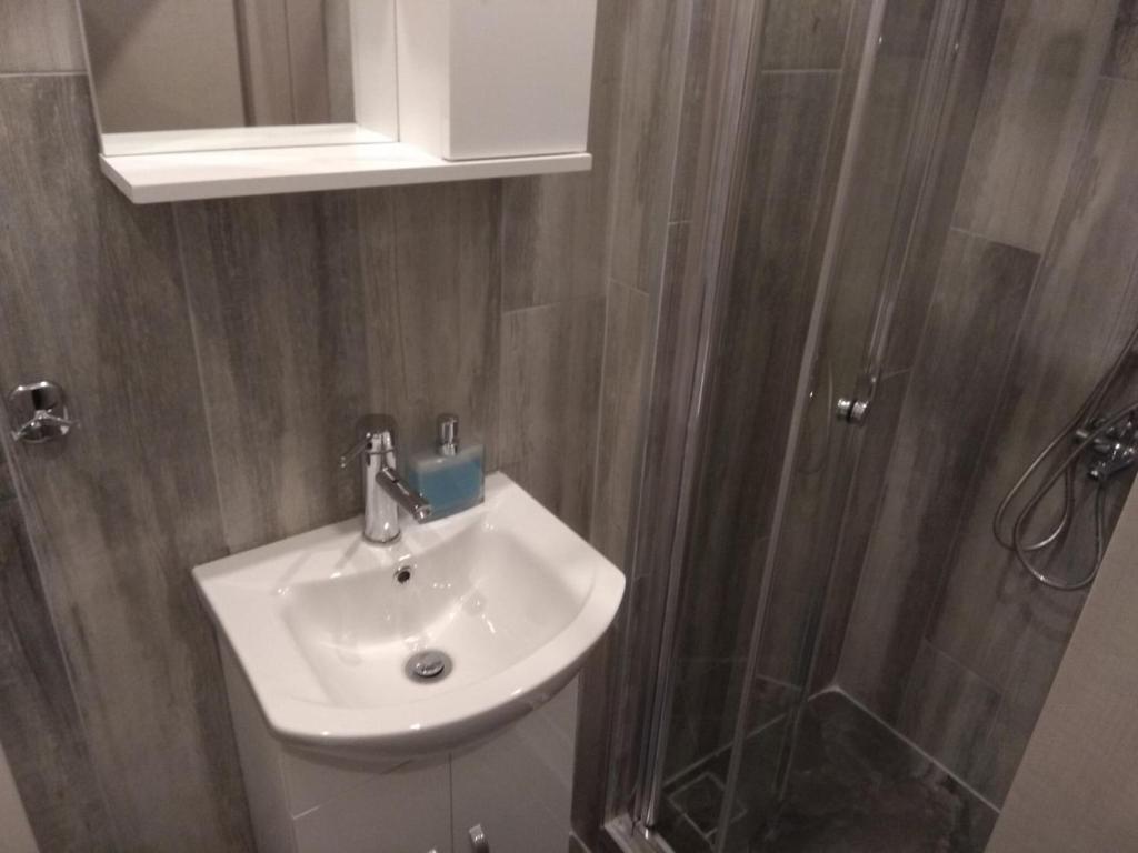 Koupelna v ubytování FLOW - White Tower Two Bedroom Suite