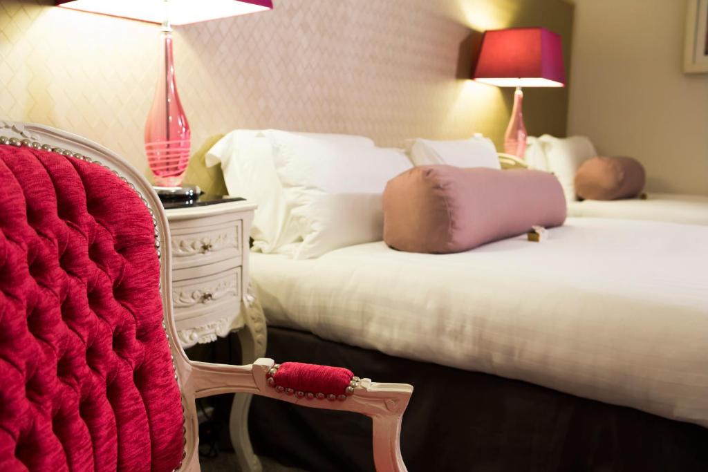 Postel nebo postele na pokoji v ubytování Hotel Kilkenny