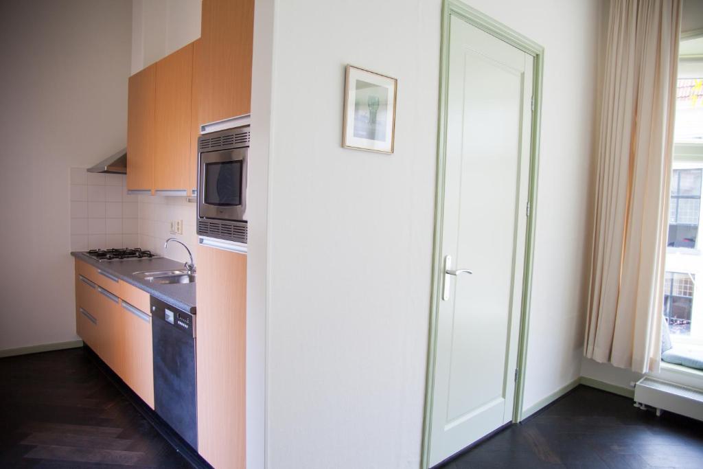 Kuchyň nebo kuchyňský kout v ubytování Gelkingehof Aparthotel
